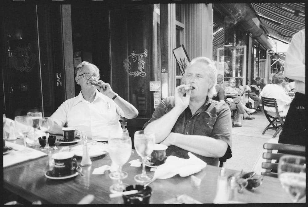 a group of people sitting at a table