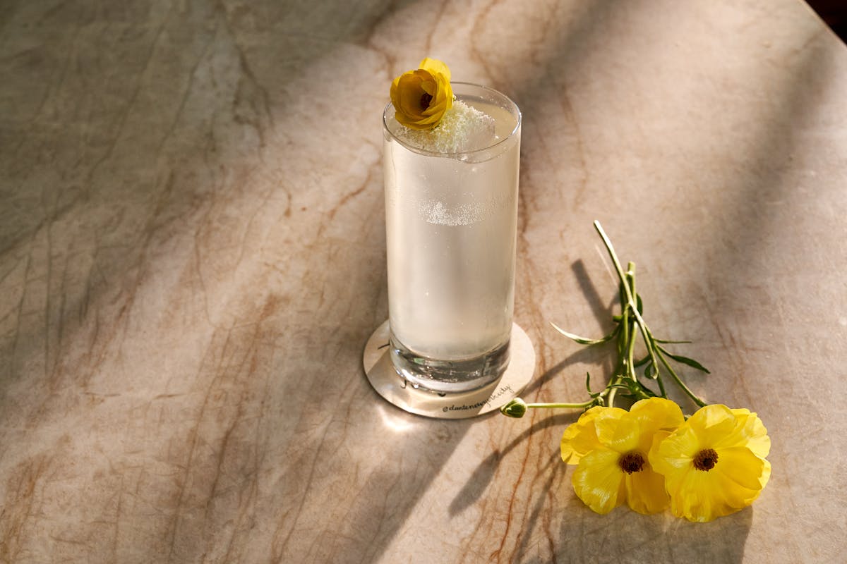 a vase filled with flowers sitting on a table