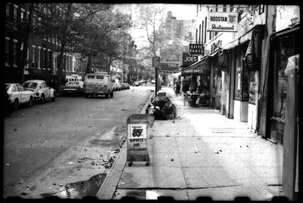 a black and white photo of a city street