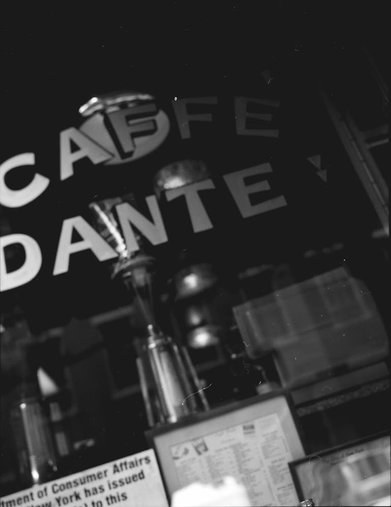 a black sign with white letters